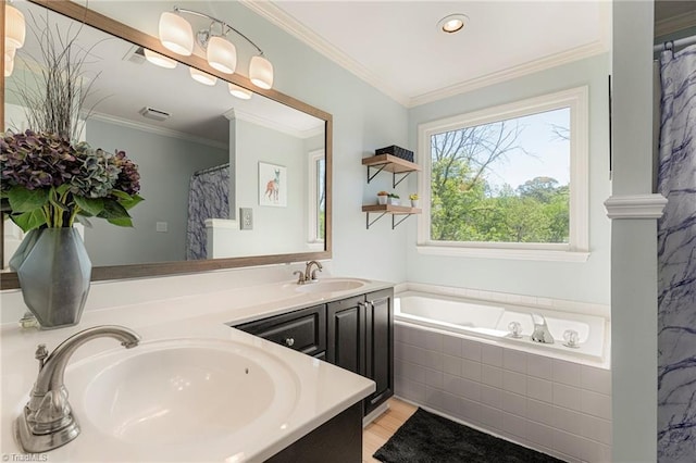full bath featuring double vanity, a sink, crown molding, and a bath
