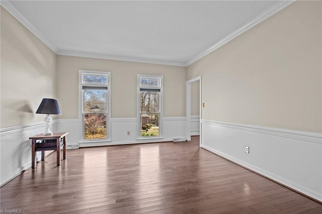 interior space with wood-type flooring and ornamental molding