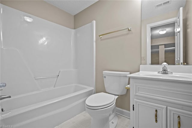 full bathroom featuring shower / washtub combination, vanity, a textured ceiling, and toilet