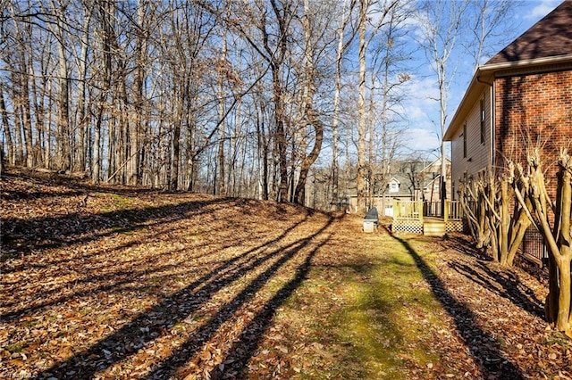 view of yard featuring a deck