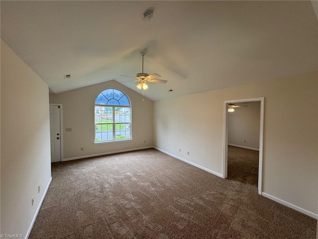8 Franklinwood Dr, Greensboro, NC 27401 - unfurnished room with a ceiling fan, carpet flooring, vaulted ceiling, baseboards, and a smoke detector