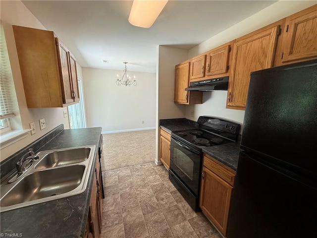 8 Franklinwood Dr, Greensboro, NC 27401 - kitchen featuring black appliances, under cabinet range hood, a chandelier, dark countertops, and a sink