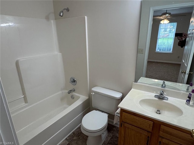 8 Franklinwood Dr, Greensboro, NC 27401 - bathroom featuring toilet, shower / washtub combination, vanity, ceiling fan, and baseboards