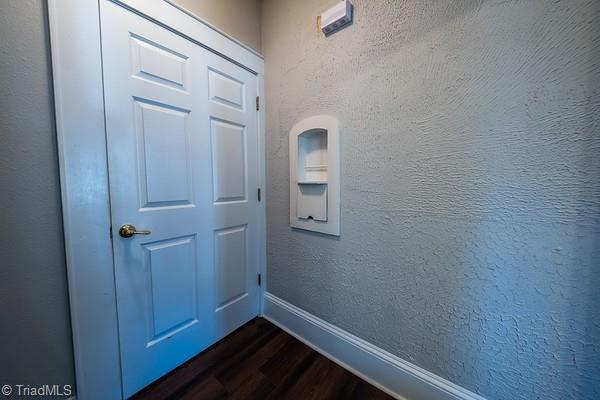 entryway featuring dark wood-type flooring