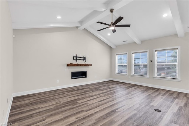 unfurnished living room featuring ceiling fan, vaulted ceiling with beams, and hardwood / wood-style flooring