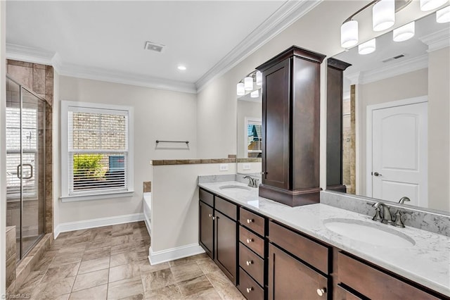 bathroom featuring tile patterned floors, vanity, ornamental molding, and independent shower and bath