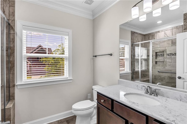 bathroom with toilet, vanity, wood-type flooring, ornamental molding, and an enclosed shower