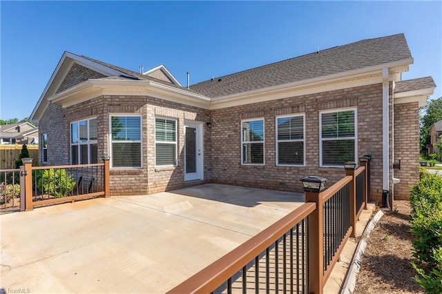 rear view of property with a patio area