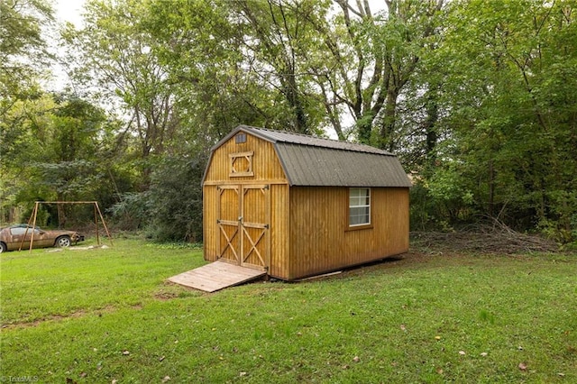 view of outdoor structure with a yard