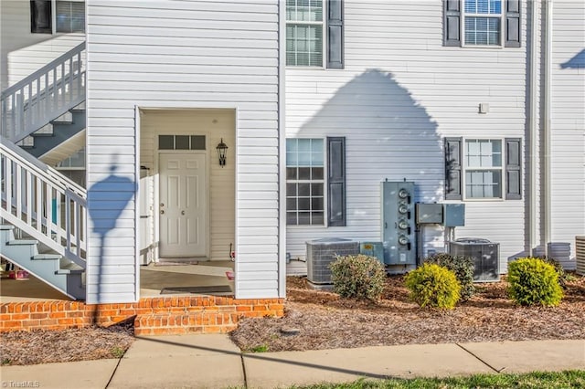 property entrance featuring cooling unit