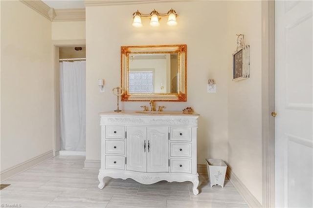 bathroom featuring vanity, crown molding, curtained shower, and baseboards