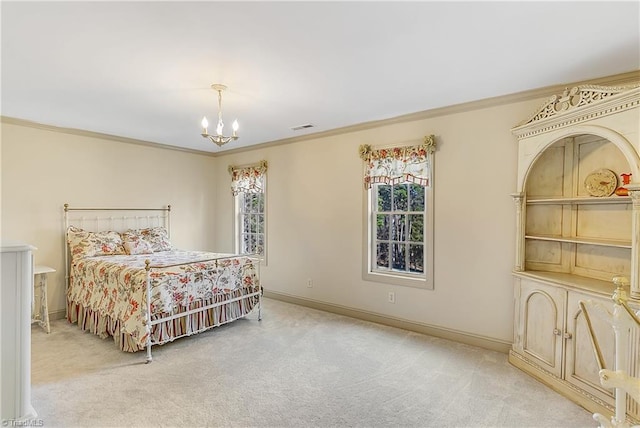 bedroom with a chandelier, visible vents, carpet floors, and ornamental molding