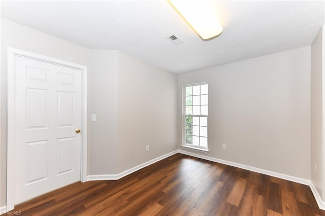 320 Apple Ridge Rd, Greensboro, NC 27406 - spare room with dark wood-style flooring and baseboards