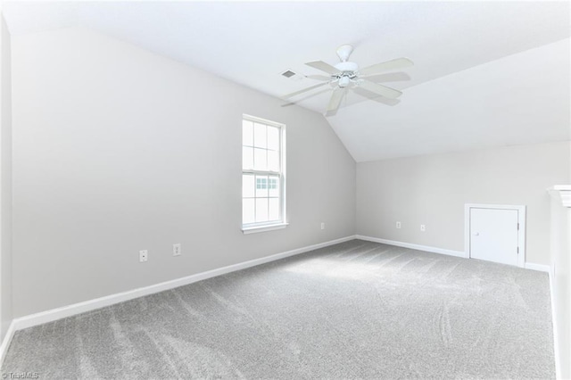 320 Apple Ridge Rd, Greensboro, NC 27406 - additional living space with vaulted ceiling, carpet, baseboards, and a ceiling fan