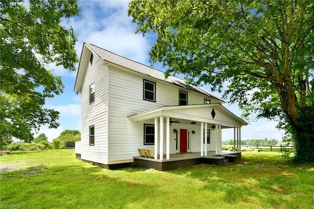 2244 US Highway 64 E, Mocksville, NC 27028 - view of front of home with covered porch, a front yard, and a ceiling fan