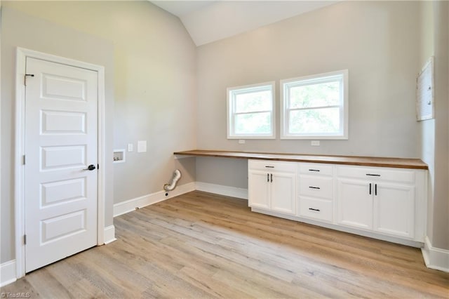 2244 US Highway 64 E, Mocksville, NC 27028 - laundry area featuring washer hookup, light wood-style flooring, cabinet space, and hookup for a gas dryer