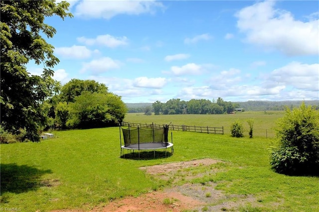 2244 US Highway 64 E, Mocksville, NC 27028 - view of yard with a trampoline and a view of countryside
