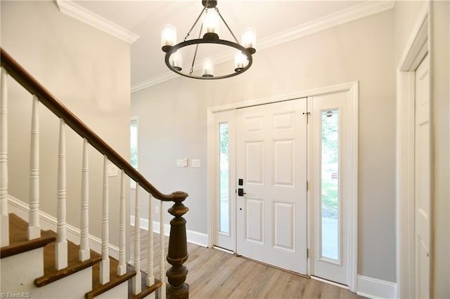 2244 US Highway 64 E, Mocksville, NC 27028 - entryway with a chandelier, stairs, ornamental molding, and light wood-style floors