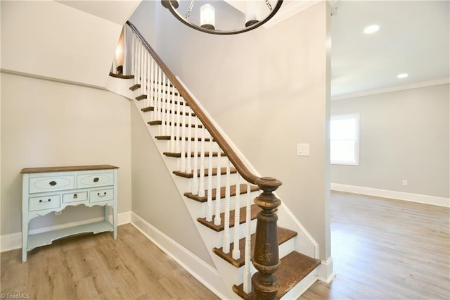 2244 US Highway 64 E, Mocksville, NC 27028 - stairs featuring a chandelier, crown molding, wood finished floors, and recessed lighting