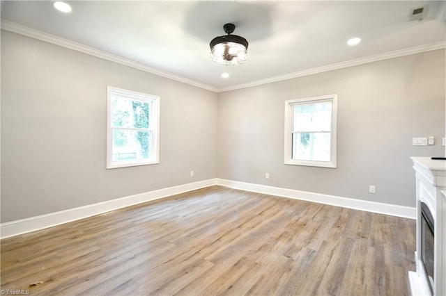 2244 US Highway 64 E, Mocksville, NC 27028 - unfurnished living room with ornamental molding, light wood-type flooring, and recessed lighting