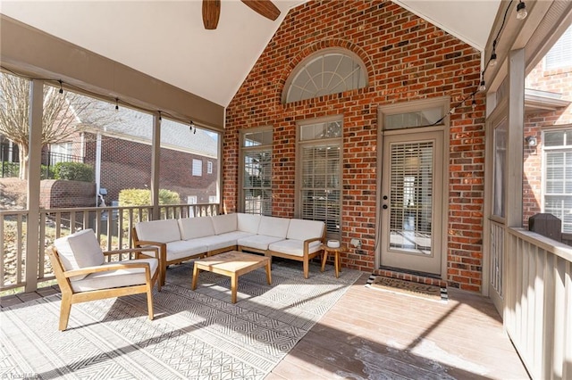 sunroom / solarium with vaulted ceiling