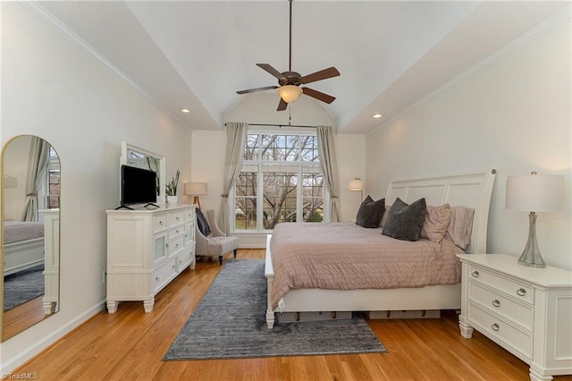 bedroom featuring light wood-type flooring, vaulted ceiling, and recessed lighting