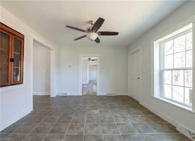 1473 Briarcliff Dr, Asheboro, NC 27205 - spare room featuring visible vents, baseboards, and ceiling fan