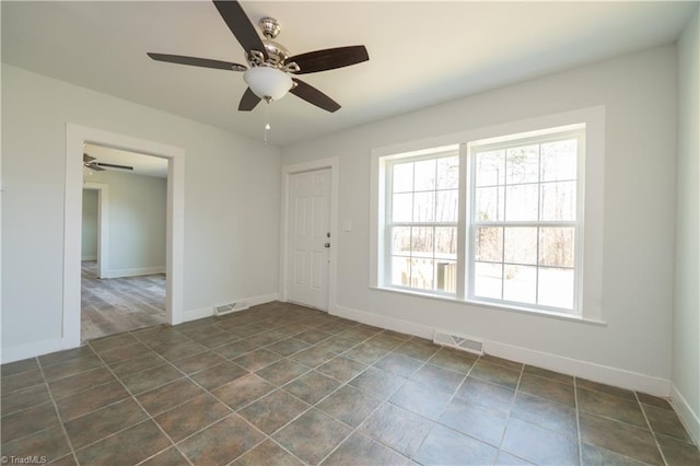 1473 Briarcliff Dr, Asheboro, NC 27205 - empty room with baseboards, visible vents, and ceiling fan
