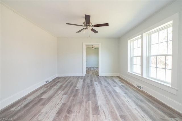 1473 Briarcliff Dr, Asheboro, NC 27205 - unfurnished room with light wood-type flooring, baseboards, and ceiling fan