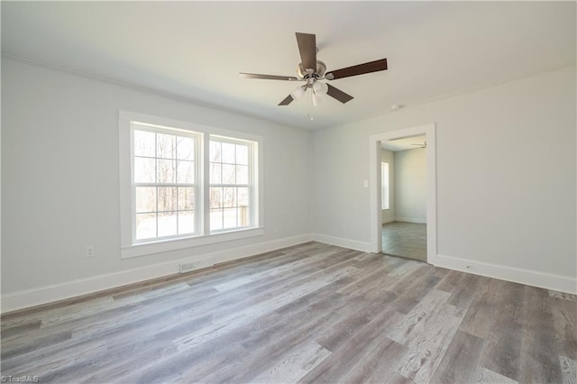 1473 Briarcliff Dr, Asheboro, NC 27205 - spare room featuring ceiling fan, visible vents, baseboards, and wood finished floors