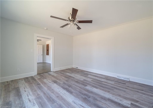 1473 Briarcliff Dr, Asheboro, NC 27205 - spare room featuring visible vents, baseboards, ceiling fan, and wood finished floors