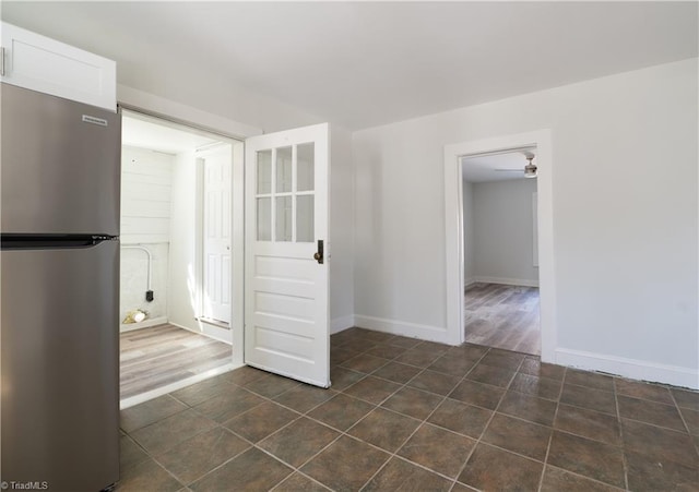 1473 Briarcliff Dr, Asheboro, NC 27205 - spare room featuring dark tile patterned floors and baseboards