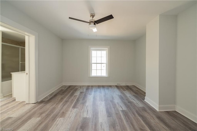 1473 Briarcliff Dr, Asheboro, NC 27205 - spare room with baseboards, a ceiling fan, and wood finished floors