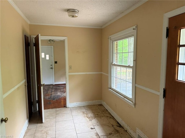 615 Paris St, Graham, NC 27253 - empty room with a textured ceiling, crown molding, and baseboards