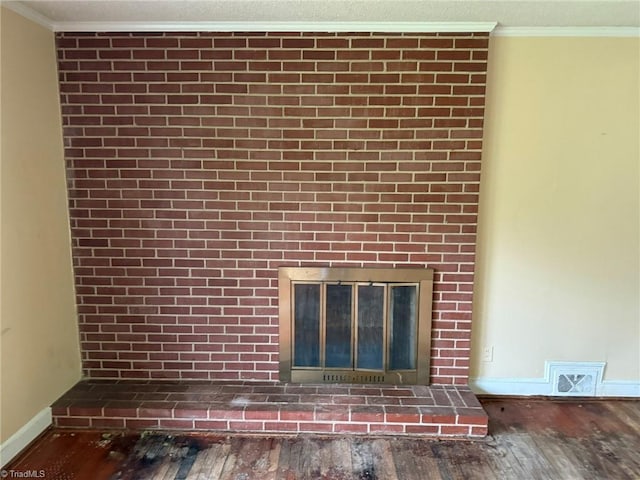 615 Paris St, Graham, NC 27253 - room details featuring baseboards, crown molding, and wood finished floors