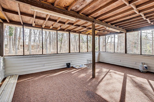 unfurnished sunroom featuring plenty of natural light