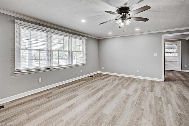 unfurnished room with crown molding, a textured ceiling, ceiling fan, and light hardwood / wood-style flooring