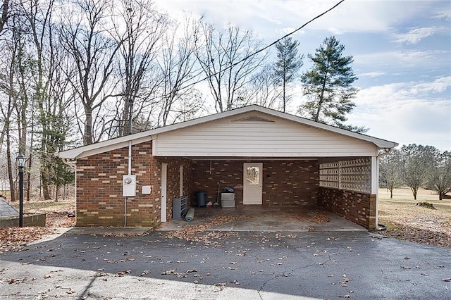 garage featuring a carport