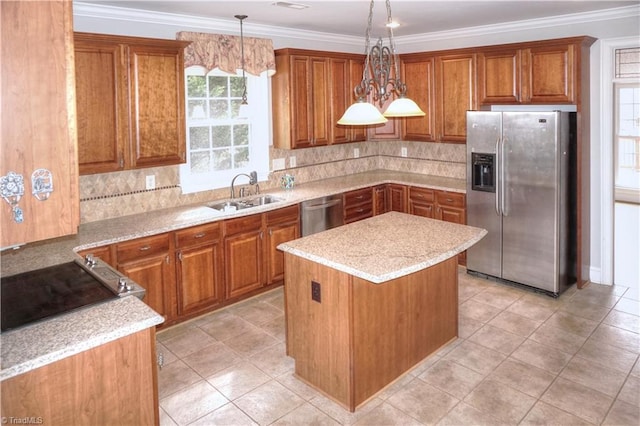 kitchen with a sink, brown cabinets, a kitchen island, and appliances with stainless steel finishes