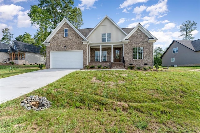 craftsman-style house with a front yard, driveway, a garage, crawl space, and brick siding
