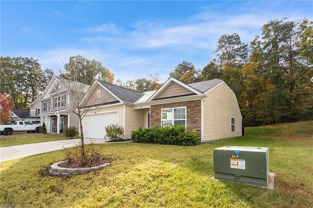 view of front of home featuring a garage and a front lawn