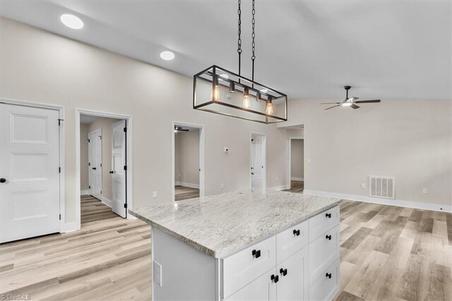 3077 Little Creek Dr, Thomasville, NC 27360 - kitchen featuring a ceiling fan, light wood-style floors, pendant lighting, and white cabinetry