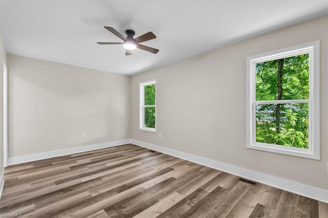 3077 Little Creek Dr, Thomasville, NC 27360 - unfurnished room featuring a ceiling fan and wood finished floors