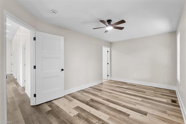 3077 Little Creek Dr, Thomasville, NC 27360 - unfurnished bedroom with light wood-style floors and a ceiling fan