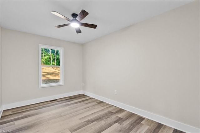 3077 Little Creek Dr, Thomasville, NC 27360 - unfurnished room with wood finished floors and a ceiling fan