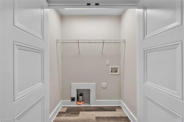 3077 Little Creek Dr, Thomasville, NC 27360 - laundry area featuring wood finished floors, hookup for a gas dryer, hookup for a washing machine, and electric dryer hookup