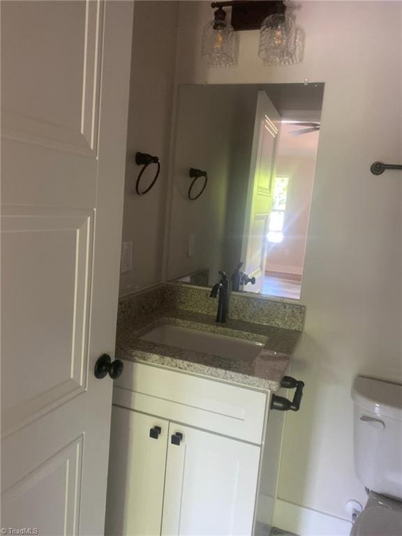 3077 Little Creek Dr, Thomasville, NC 27360 - bathroom featuring vanity and toilet