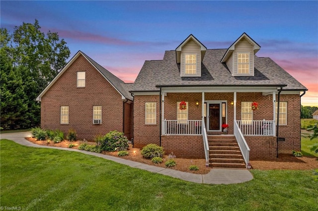 159 Forest Abbey Ln, China Grove, NC 28023 - view of front of property featuring brick siding, covered porch, a lawn, and roof with shingles