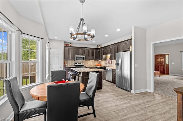159 Forest Abbey Ln, China Grove, NC 28023 - dining space featuring a chandelier, light wood-style floors, and recessed lighting