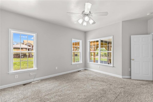159 Forest Abbey Ln, China Grove, NC 28023 - carpeted empty room featuring plenty of natural light and ceiling fan